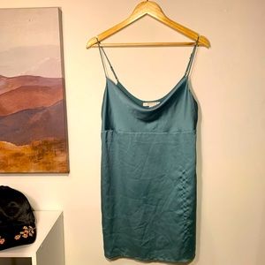 Teal slip dress, spaghetti straps.